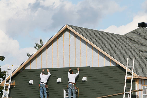 Professional Emergency Siding Repair technician working in Newtonville, MA